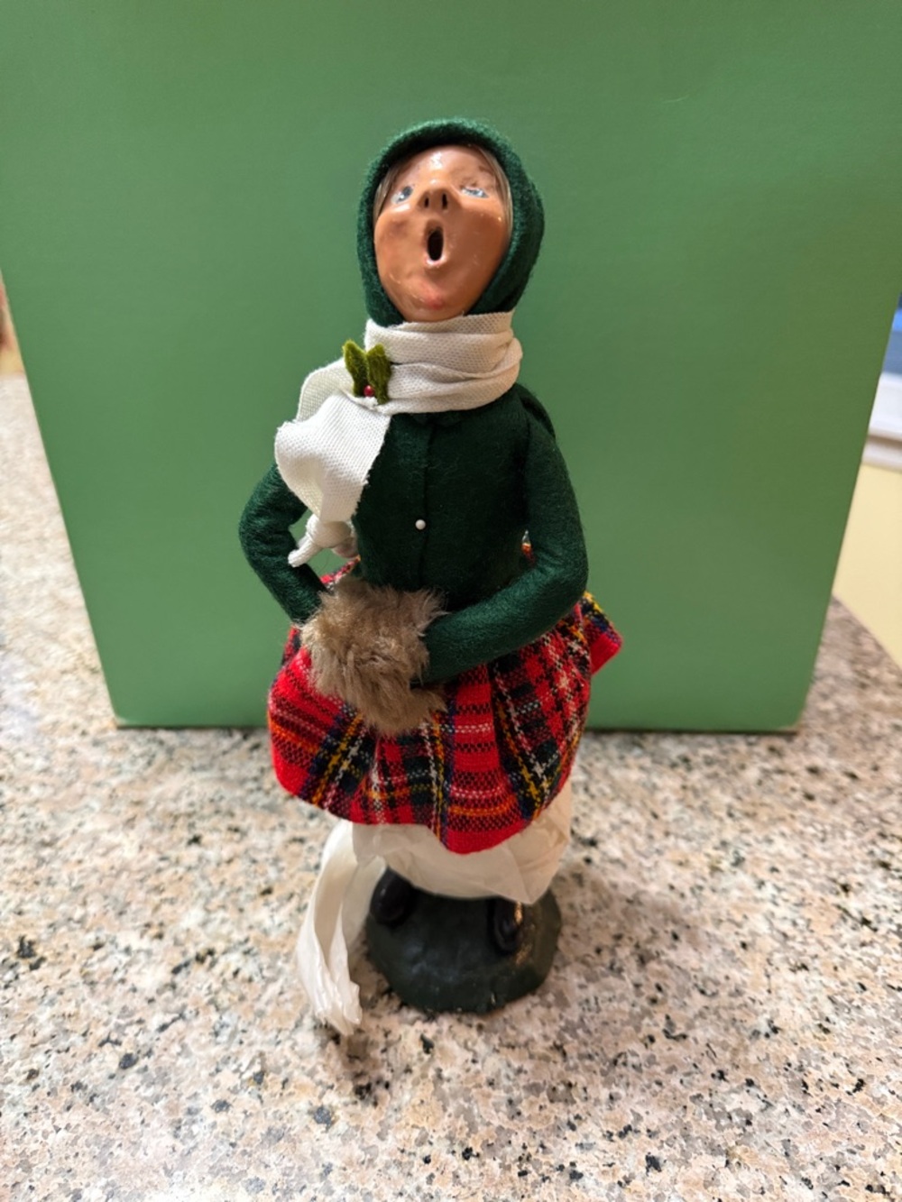 Green-Clad Holiday Caroler Figurine with Red Plaid Skirt